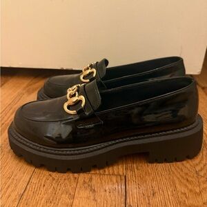 Glossy Black Loafers with Gold Chain Detail